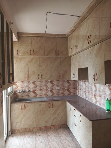Kitchen in 2 BHK Apartment at Amrapali Golf Homes, Sector 4, Greater Noida – for Rent