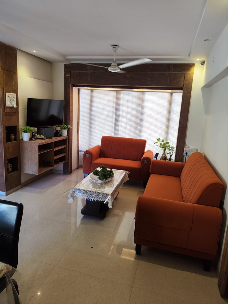 Living Room, cosmos-jewels-solitaire 3 Bedroom 1050 Sq.Ft. Apartment In Pratha Pushp Society Thane 8107030