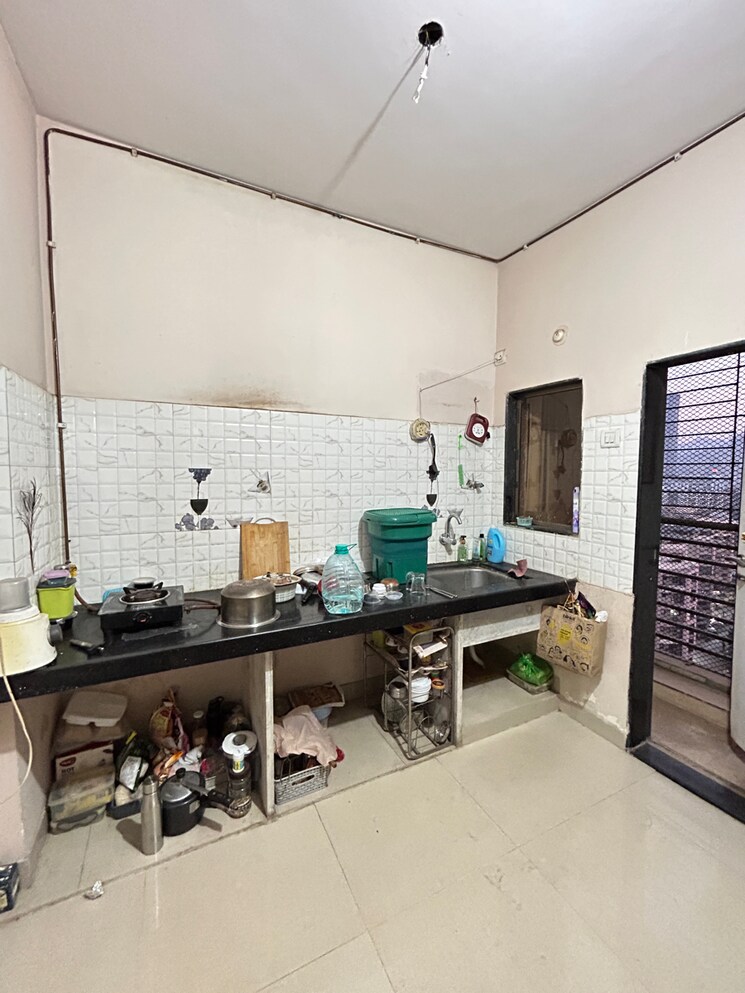 Kitchen, rajaram-sukur-enclave-b-wing 1 Bedroom 810 Sq.Ft. Apartment In Kasarvadavali Thane 8107035