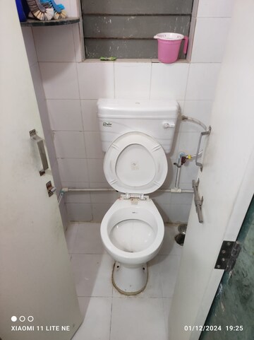 Master Bedroom in 1 BHK Apartment at Karan Ashiyana, Wadgaon Sheri – for Sale
