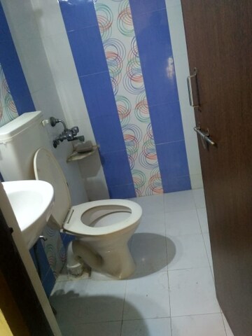 Bathroom in 2 BHK Apartment at Shree Balaji Agora Residency, Sughad – for Rent