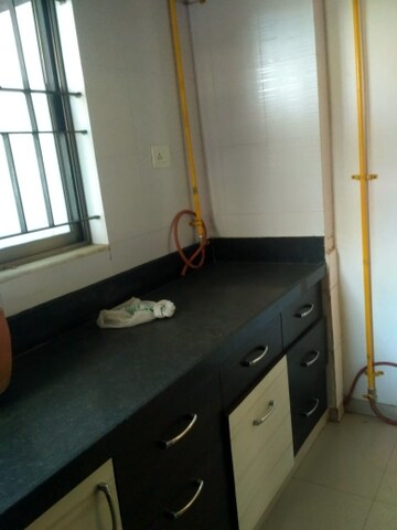 Kitchen in 2 BHK Apartment at Shree Balaji Agora Residency, Sughad – for Rent