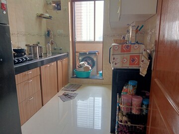 Kitchen in 2 BHK Apartment at K Raheja Heights, Malad East – for Rent