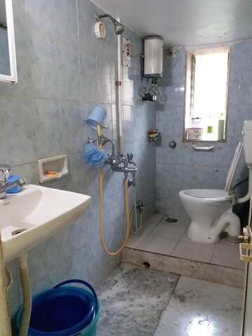 Bathroom in Studio Apartment at Bandra West – for Sale
