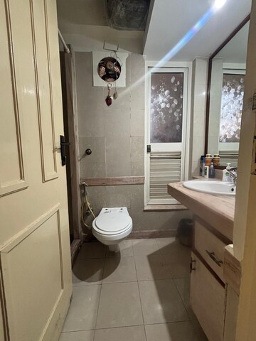 Bathroom in 2 BHK Apartment at Hiranandani Gardens Glen Height, Powai – for Rent