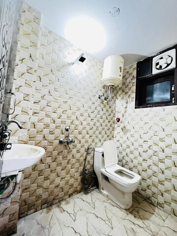 Bathroom in 1 BHK Builder Floor at Freedom Fighters Enclave – for Rent