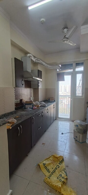Kitchen in 3 BHK Apartment at Amrapali Platinum, Sector 119 – for Rent