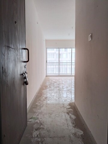 Building Lobby in 1.5 BHK Apartment at Marathon Nexzone, New Panvel – for Rent