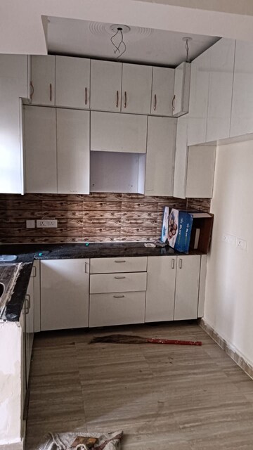 Kitchen in 2 BHK Apartment at Prateek Wisteria, Sector 77 – for Rent