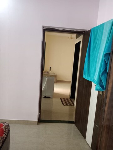Room in 2 BHK Apartment at Mohan Suburbia, Ambernath West – for Rent