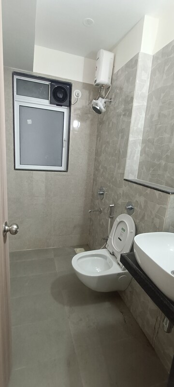 Bathroom in 1 BHK Apartment at Ashar Axis, Majiwada – for Rent