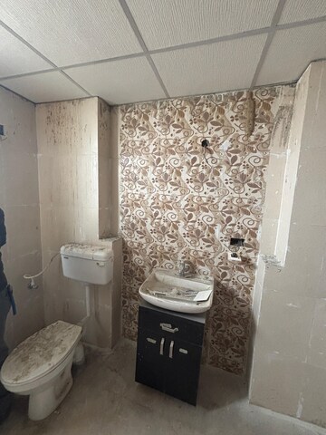 Bathroom in 4 BHK Apartment at Sanchar Nest Palm Heights, Wave City – for Rent
