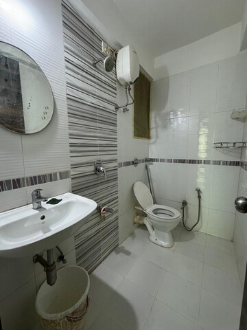 Bathroom in 2 BHK Apartment at Rosa Gardenia, Ghodbunder Road – for Rent
