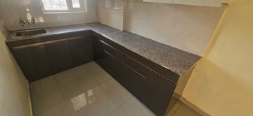 Kitchen in 2 BHK Apartment at MRG The Balcony, Sector 93 – for Rent