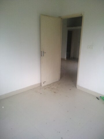 Room in 2.5 BHK Apartment at Godrej Prakriti, Bt Road – for Sale