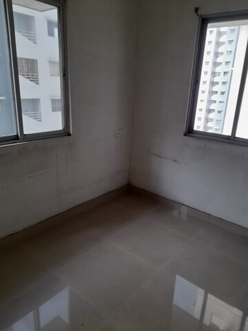 Room in 2.5 BHK Apartment at Godrej Prakriti, Bt Road – for Sale