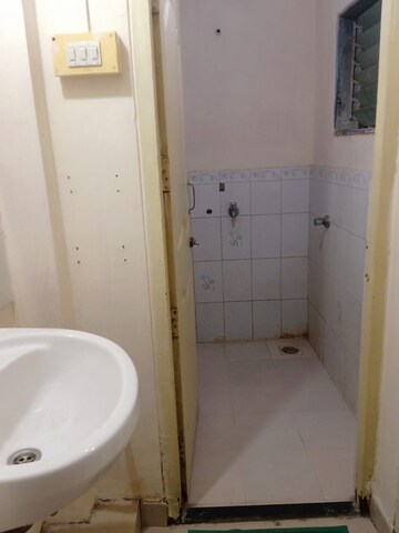 Bathroom in 1 BHK Apartment at New Mhada Tower, Malad West – for Rent