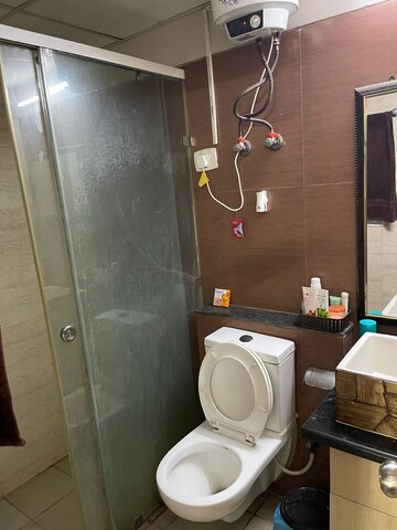 Bathroom in 2 BHK Apartment at Aims Golf Avenue II, Sector 75 – for Rent