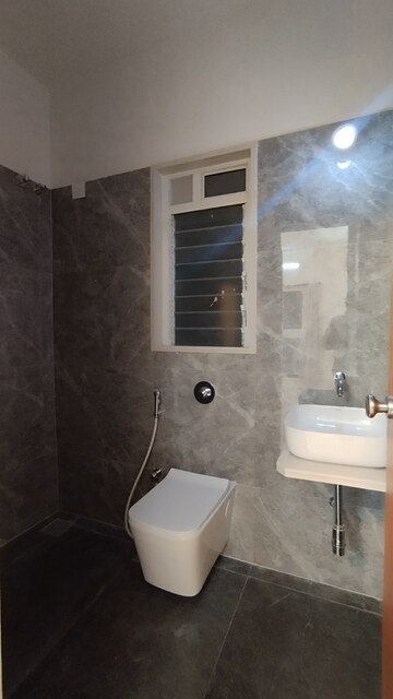 Bathroom in 3 BHK Apartment at Triveni Pearl, Khadakpada – for Sale