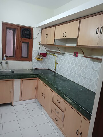 Kitchen in 2 BHK Apartment at Royal Garden Estate, Sector 61 – for Rent