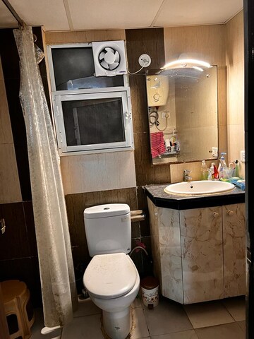 Bathroom in 3 BHK Apartment at Nimbus The Hyde park, Sector 78 – for Rent