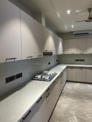 Kitchen in 4 BHK Apartment at Vasant Vihar – for Sale