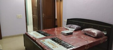 Bedroom in 2 BHK Builder Floor at Dhakoli Village – for Rent