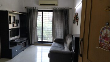 Living Room in 1 BHK Apartment at K Raheja Heights, Malad East – for Rent