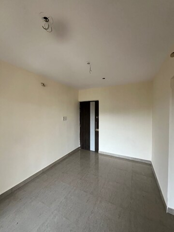 Room in 2 BHK Apartment at Mohan Willows, Badlapur East – for Rent