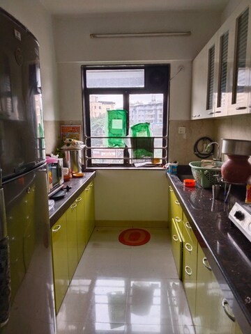Kitchen in 2.5 BHK Apartment at Kanakia Spaces Niharika, Manpada – for Rent