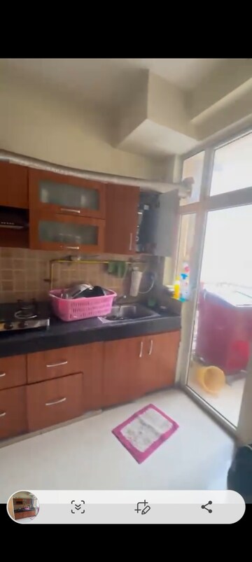 Kitchen in 3 BHK Apartment at Mahagun Mywoods, Sector 16c Greater Noida – for Rent