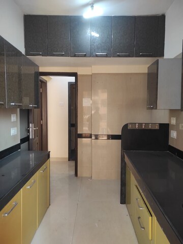 Kitchen in 2 BHK Apartment at K Raheja Heights, Malad East – for Rent
