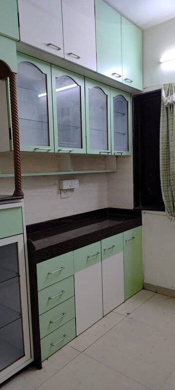 Kitchen in 4 BHK Apartment at Kabra Hyde Park, Manpada – for Rent