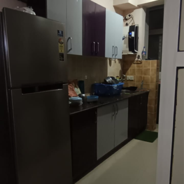Kitchen in 2 BHK Apartment at Aims Golf Avenue I, Sector 75 – for Rent