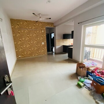 Living Room in 2 BHK Apartment at Gardenia Golf City, Noida Central – for Rent