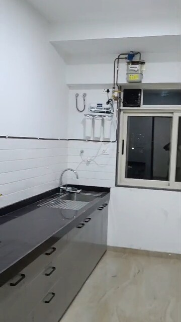 Kitchen in 3 BHK Apartment at Acropolis Apartment, Andheri West – for Rent