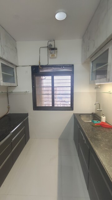 Kitchen in 2 BHK Apartment at Acme Ozone, Manpada – for Rent