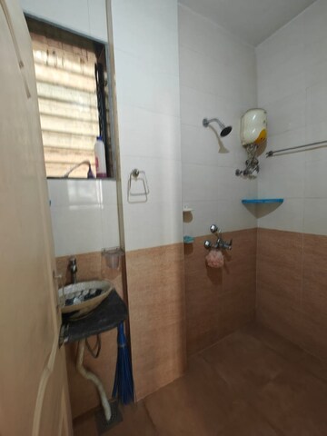 Bathroom in 1 BHK Apartment at Simran View, Nerul – for Rent