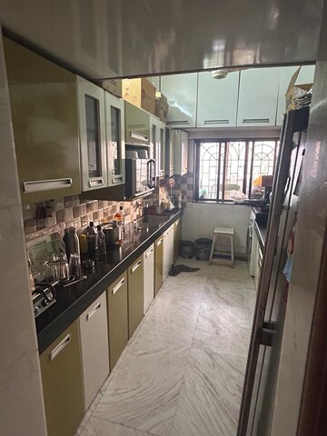 Kitchen in 2 BHK Apartment at Powai Cosmopolitan CHS, Powai – for Rent