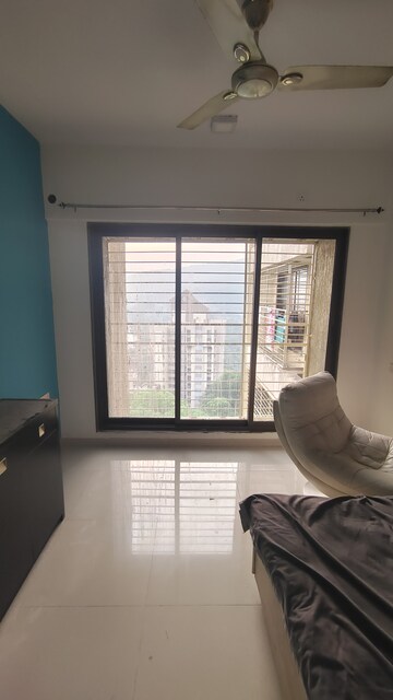 Living Room in 2 BHK Apartment at Acme Ozone, Manpada – for Rent