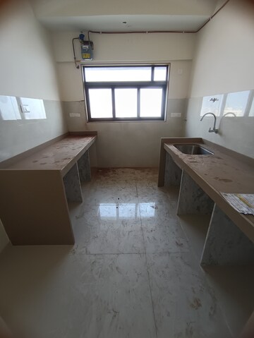 Kitchen in 2 BHK Apartment at Lotus Sky Garden, Malad West – for Rent