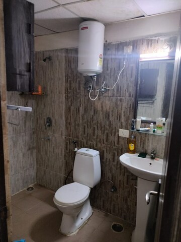 Bathroom in 3 BHK Apartment at Amrapali Silicon City, Sector 76 – for Rent