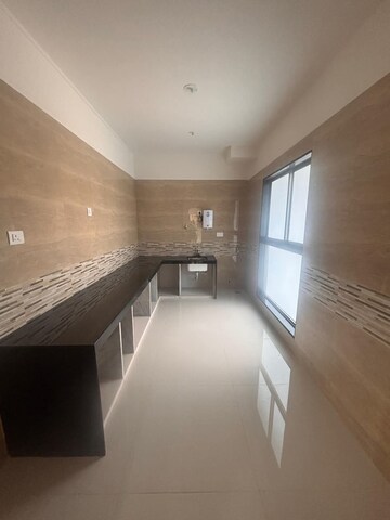 Kitchen in 3 BHK Apartment at Rajesh Raj Infinia, Malad West – for Rent