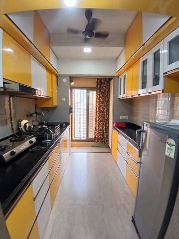 Kitchen in 3 BHK Apartment at Madhav Palacia, Ghodbunder Road – for Rent