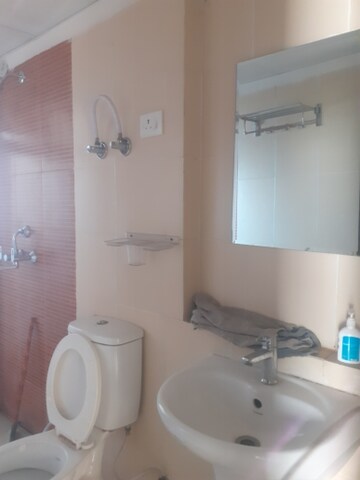 Bathroom in 3 BHK Apartment at Mahagun Mywoods, Sector 16c Greater Noida – for Rent
