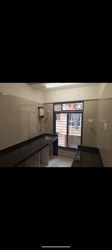 Kitchen in 2 BHK Apartment at Adityaraj Breeze, Vikhroli East – for Rent