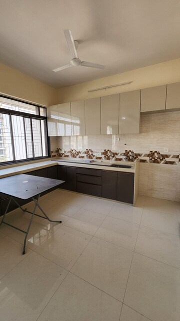 Kitchen in 2 BHK Apartment at Utopia Garden Grove Mall, Borivali West – for Rent