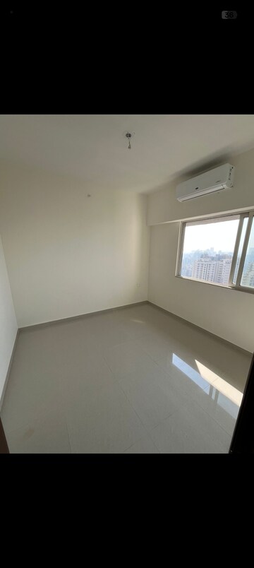 Room in 2 BHK Apartment at Omkar Signet, Malad East – for Rent