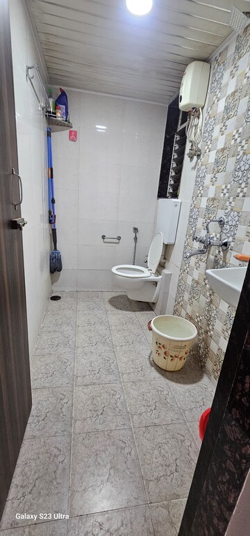 Bathroom in 2 BHK Apartment at Dharti Presidio, Malad West – for Sale