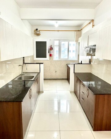 Kitchen in 3 BHK Apartment at L&T Raintree Boulevard, Hebbal – for Rent